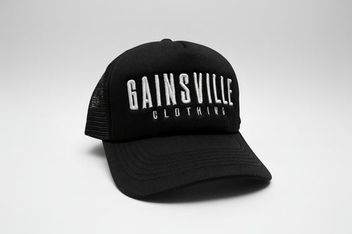 Black cap with 'Gainesville Clothing' text on a white background